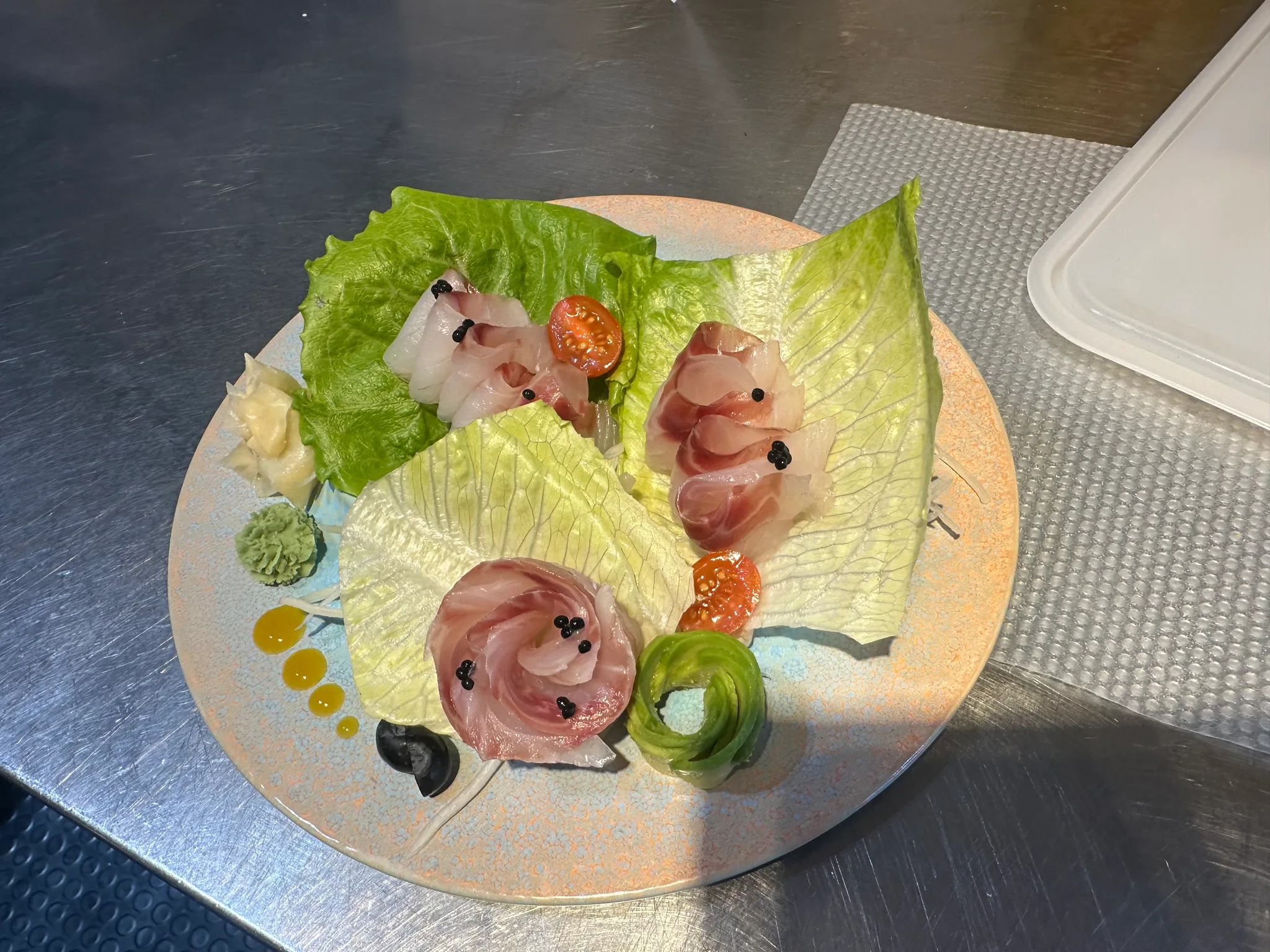 23.SASHIMI LUBINA